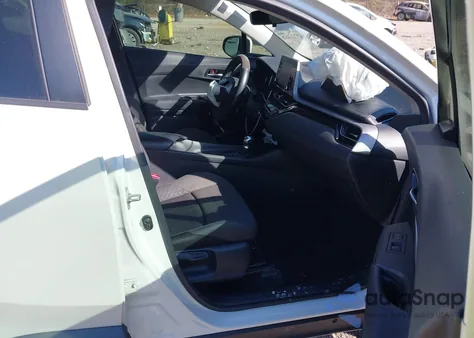 2021 Toyota C-Hr Le z USA, uszkodzony, nr VIN JTNKHMBX9M1106896